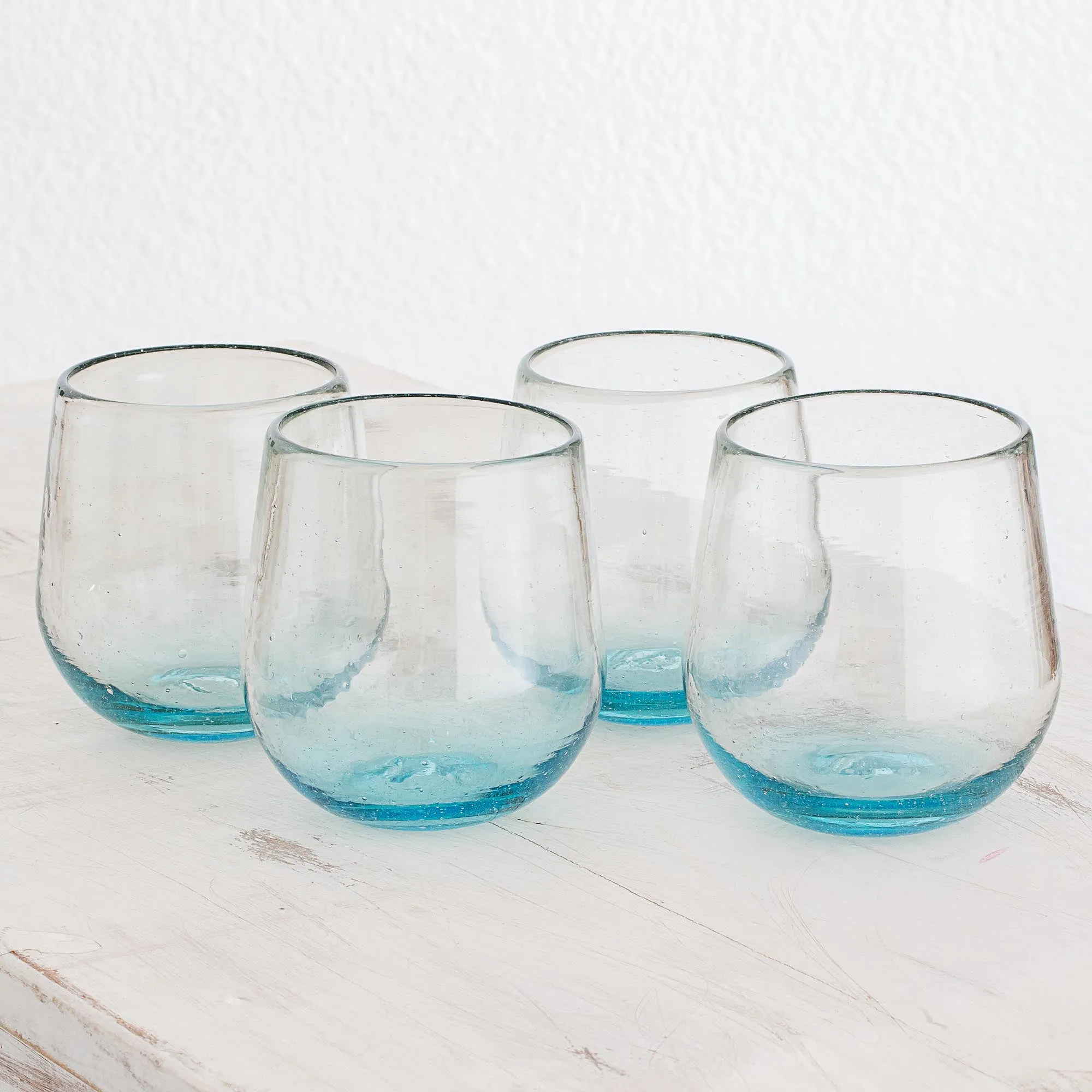 Set of Four Recycled Glass Stemless Wine Glasses in Blue - Glistening Sea | NOVICA